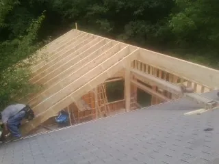 Framing a new roof addition that ties into an existing shingle roof in Nescopeck